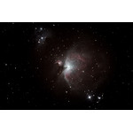 The great Orion Nebula (M42) in the constellation of Orion, an active star-forming region. The nebula appears bluish in a telescope. (c) Andreas Koch
